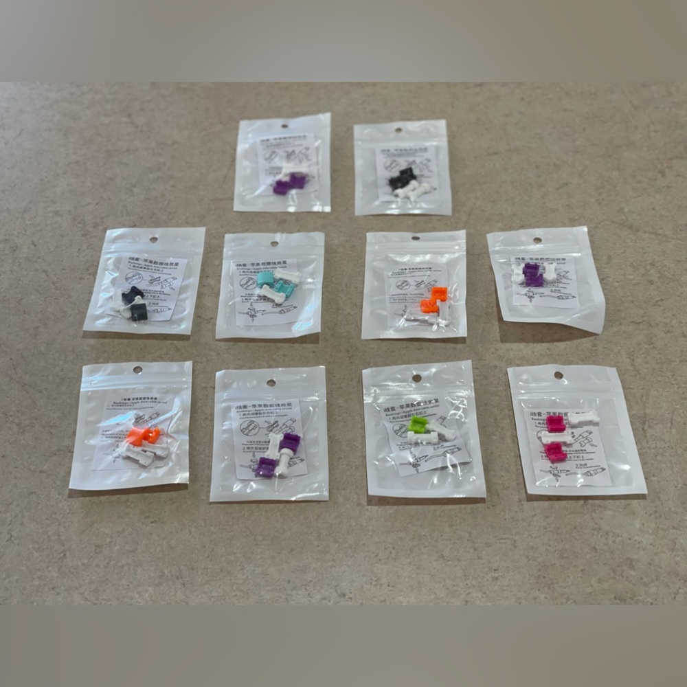 Various colors set of 10 plastic charging cord protectors and identifiers